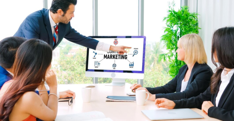 Business professionals discussing B2B digital marketing services and strategies.